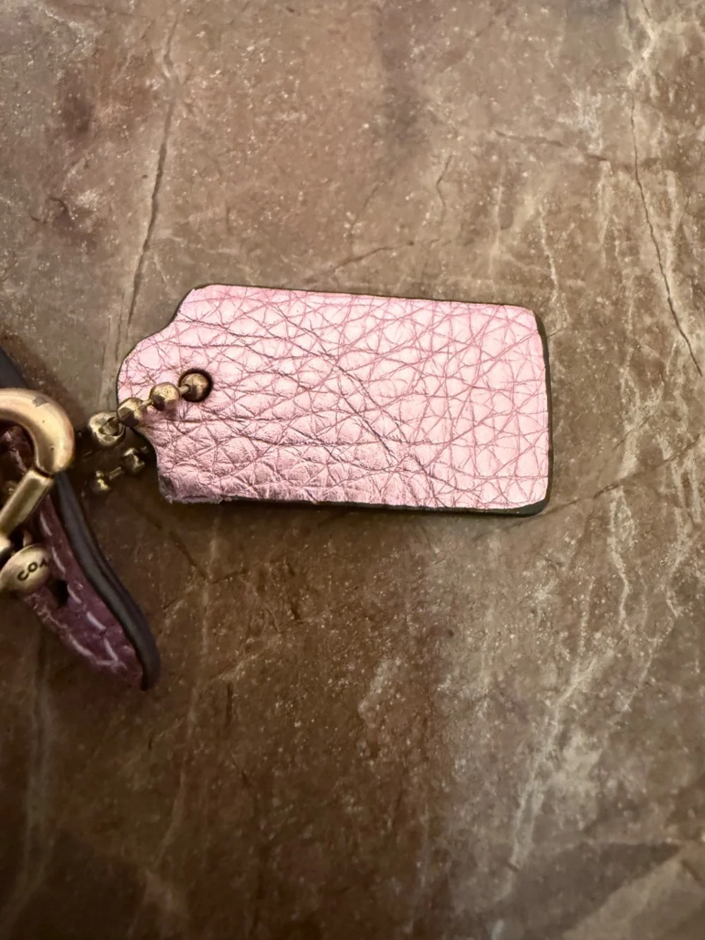 Coach Pebbled Leather Wrist Strap Loop Bag Charm with Hangtag Metallic Pink
